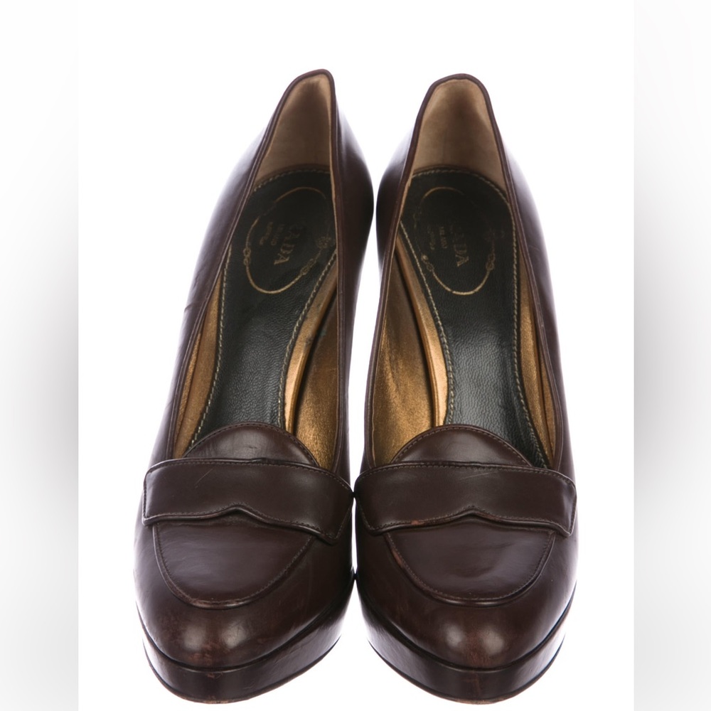 Prada round-toe loafer pumps, brown leather, tonal stitching and stacked heels.